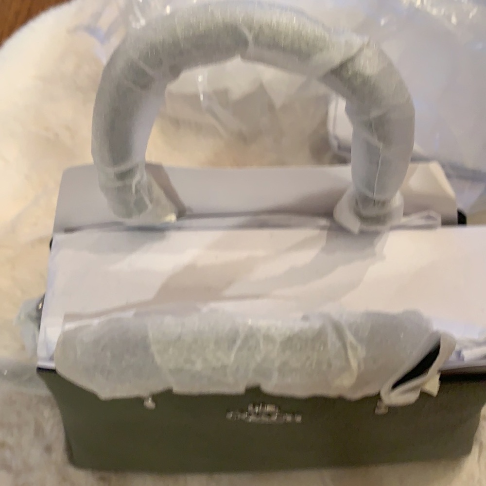 NWT. Coach Minicarryall - Picture 3 of 7
